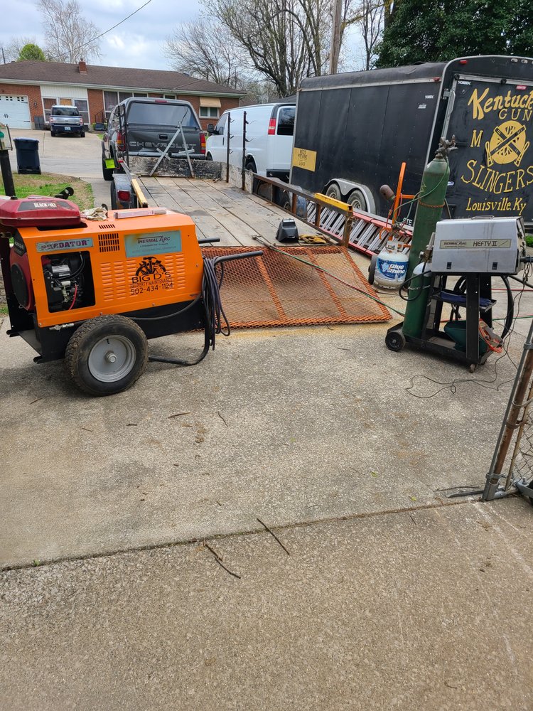 Slide of Big D's Property Maintenance