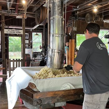 B.F. Clyde's Cider Mill - Pressing the apples - Cideries Near Me - Mystic, Connecticut