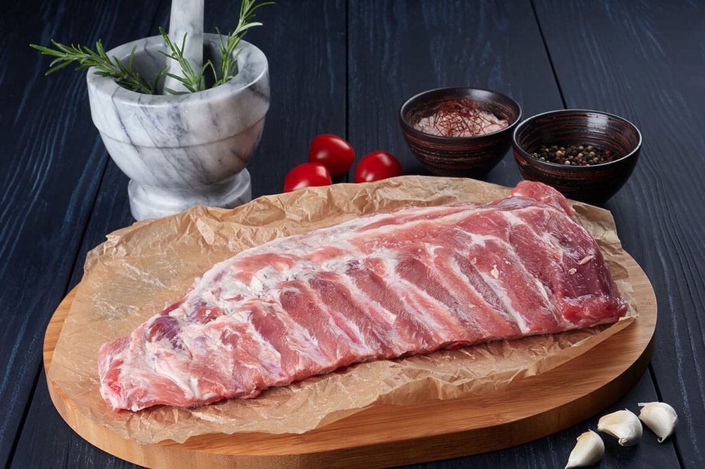 RegioMex Quality Meats Logo