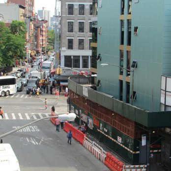 Manhattan Bridge - Manhattan streets below from pedestrian walkway (south side of bridge) - Landmarks & Historical Buildings Near Me Manhattan Bridge - Manhattan streets below from pedestrian walkway (south side of bridge) - Landmarks & Historical Buildings Near Me