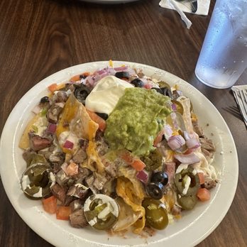 Mountain Oaks Cafe - Tri tip nachos - American Near Me - Oakhurst, California Mountain Oaks Cafe - Tri tip nachos - American Near Me - Oakhurst, California