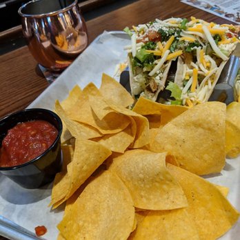 The Brass Tap - Chicken tacos with flour tortillas and homemade chips - Beer Bar Near Me - Towson, Maryland The Brass Tap - Chicken tacos with flour tortillas and homemade chips - Beer Bar Near Me - Towson, Maryland