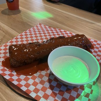 Alas Toxicas - Giant Mozzarella stick smothered in buffalo sauce with ranch - Pizza Near Me - Cerritos, California
