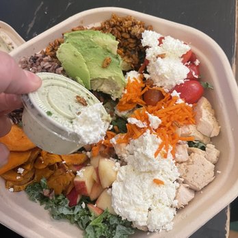 sweetgreen - Healthy Salads, Wraps, and Bowls - There was 4 2oz portion cups buried in my salad today. Once removed the salad size was much smaller. - Salad Near Me - Chicago, Illinois