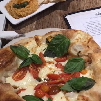 Brasil - Great margherita pizza & hummus! Owner was very nice and brought menus to our table! Gorgeous art on all of the walls. Love the cozy vibe! - Breakfast & Brunch Near Me - Houston, Texas