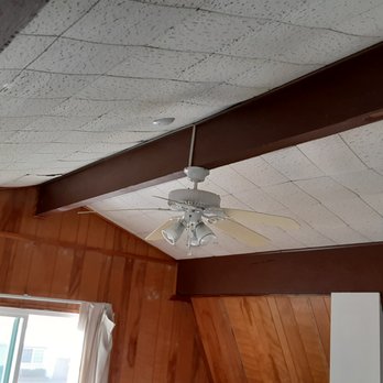 SDP Home Run Contracting - #1: Before, with falling ceiling tiles and worn fake wood panel walls - Drywall Installation & Repair Near Me - Corona, California