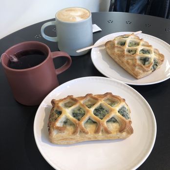 Cafe Pastel by Pastel Bakes - Spinach pastries with tea and latte - Bakeries Near Me - Toronto, Ontario Cafe Pastel by Pastel Bakes - Spinach pastries with tea and latte - Bakeries Near Me - Toronto, Ontario