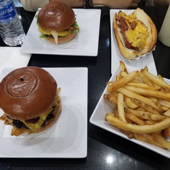 Emoji Burger - Fries, Da Wink Burger,  DA HUSH,  Emo Dog - Burgers Near Me - Jackson Heights, New York