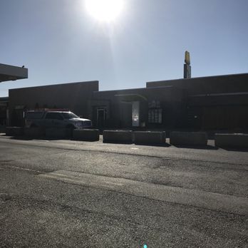 Gallahan Travel Plaza - a car parked in the parking lot - Gas Stations Near Me - Peru, Indiana