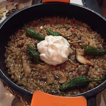 Arume - This was the duck with rice and mushrooms with a garlic foam on top. Amazing! - Mediterranean Near Me - Barcelona, B