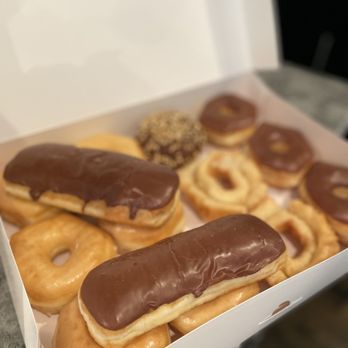 Daylight Donuts - a box of chocolate covered doughnuts - Donuts Near Me - Olathe, Kansas