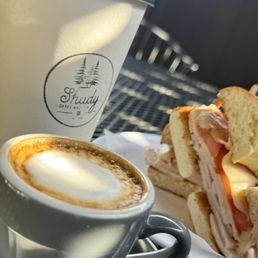 Skinny latte, macchiato and turkey bagel sandwich Skinny latte, macchiato and turkey bagel sandwich