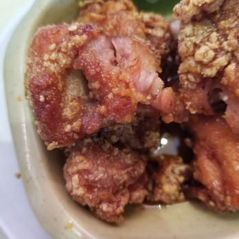 Genki Sushi - "How it's supposed to be" undercooked chicken. Waitress jasmine couldn't replace because it wasnt cold. Be careful when eating. - Sushi Bars Near Me - Honolulu, Hawaii