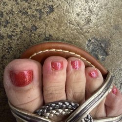 Second toe from the left, red and painful, this was the same day I got my pedicure.