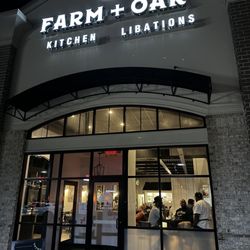 Farm And Oak - Chef Lindsey talking to patrons, he is right by the window.