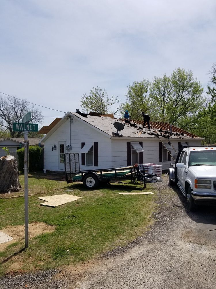Slide of Rick's Roofing & Construction