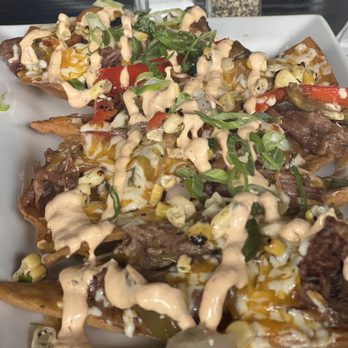 Summit Grill - Pot Roast Nachos - Bars Near Me - Kansas City, Missouri Summit Grill - Pot Roast Nachos - Bars Near Me - Kansas City, Missouri