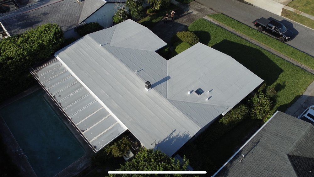 Slide of Tip Top Roofing