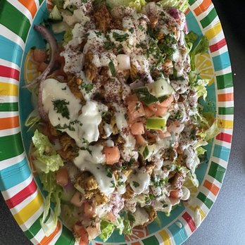 Al shishkebab - Spicy chicken shawarma over salad bursts with flavor! - Falafel Near Me - Port Richey, Florida Al shishkebab - Spicy chicken shawarma over salad bursts with flavor! - Falafel Near Me - Port Richey, Florida