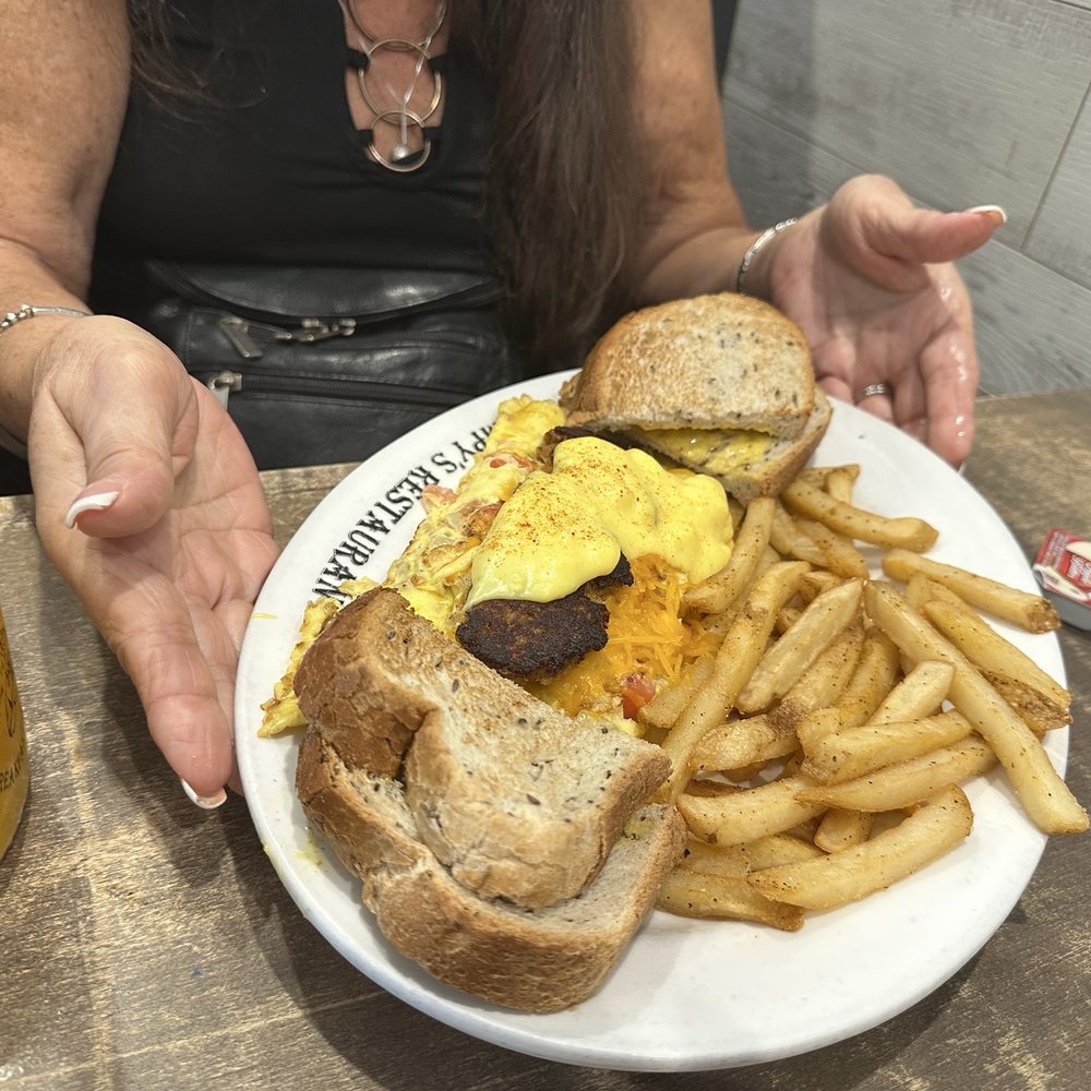 Grumpy's Restaurant - 1/2 of the Grumpy's Seafood Omelette - Breakfast & Brunch Near Me - St. Johns, Florida Grumpy's Restaurant - 1/2 of the Grumpy's Seafood Omelette - Breakfast & Brunch Near Me - St. Johns, Florida