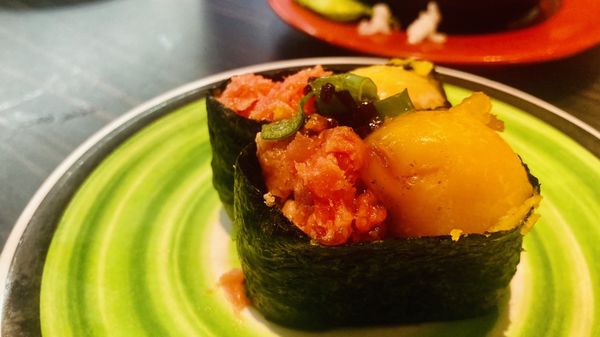 Kura Revolving Sushi Bar by null