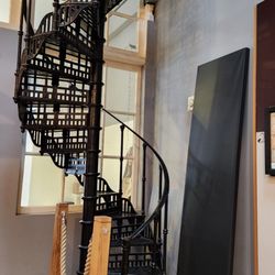 Greenwich Tourist Information Centre - Spiral staircase with each step supporting the one above.