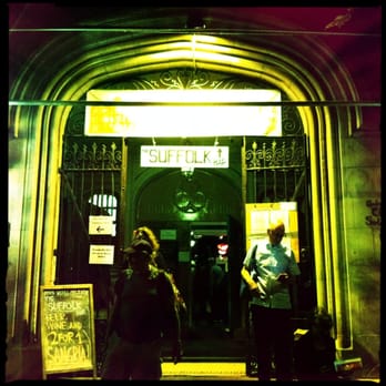 The Suffolk - people standing outside of a building - Bars Near Me - New York, New York The Suffolk - people standing outside of a building - Bars Near Me - New York, New York