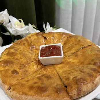 Yerevan - B CHAKAPULI had a thin layer of minced and seasoned beef inside. Couldn't finish it so took it home. Good and different - Armenian Near Me - Carmichael, California