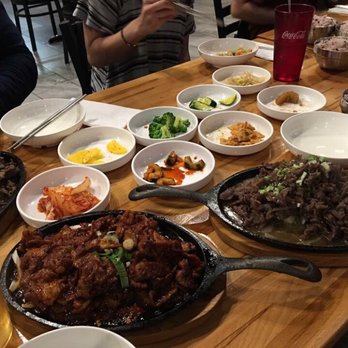 Koreatown - Spicy pork bulgogi, bulgogi, and banchan. Purple rice in the background - Korean Near Me - Mesa, Arizona Koreatown - Spicy pork bulgogi, bulgogi, and banchan. Purple rice in the background - Korean Near Me - Mesa, Arizona