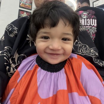 Weirdo's Barber Collective - Baby boy before haircut, full of smiles - Barbers Near Me - Los Angeles, California