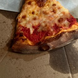 Mario's Pizza - This picture doesn't do it justice. This pizza I got the entire crust from top to bottom is hard as a rock.