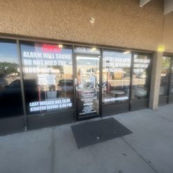 The Laundry Spot - The front of the laundromat. Information galore.