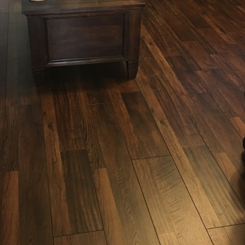 Merit Floors - a hardwood floor in a living room - Carpet Installation Near Me - Grapevine, Texas Merit Floors - a hardwood floor in a living room - Carpet Installation Near Me - Grapevine, Texas