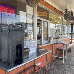 Self serve water station, pickup window, self serve salsa station Self serve water station, pickup window, self serve salsa station