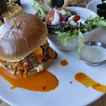Briar Common Brewery + Eatery - Buffalo chicken sandwich with a salad - New American Near Me - Denver, Colorado Briar Common Brewery + Eatery - Buffalo chicken sandwich with a salad - New American Near Me - Denver, Colorado