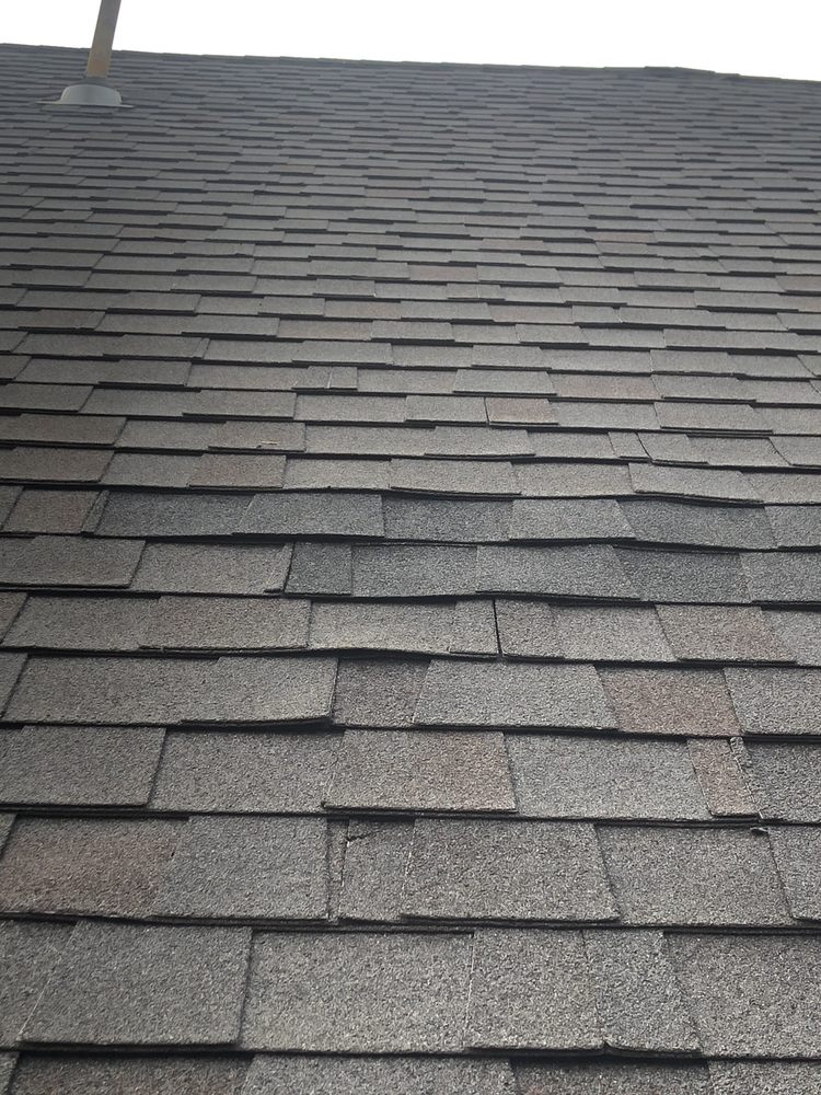 Slide of Collins Roofing