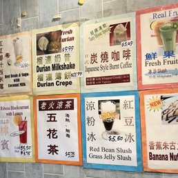 a variety of asian menus on a wall a variety of asian menus on a wall