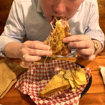What's Cookin' Downtown - A very messy Reuben. Albeit delish - American Near Me - Aiken, South Carolina What's Cookin' Downtown - A very messy Reuben. Albeit delish - American Near Me - Aiken, South Carolina