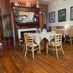 Stomping Grounds Grille - Dining space in front of Fireplace.