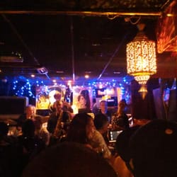 Jazz After Dark - Live music on the intimate back stage, also showing fun interior decorations.