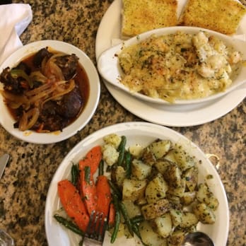 Mo's Restaurant - Delicious lamb and seafood casserole! - Haitian Near Me - Key West, Florida
