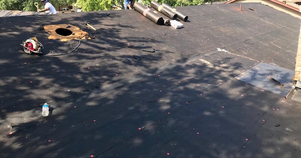 Slide of Juarez Roofing