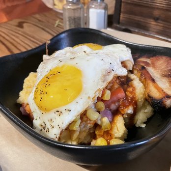 Sweet Old Bill's - Cheese grits with pork belly and tomato corn salsa - Burgers Near Me - High Point, North Carolina