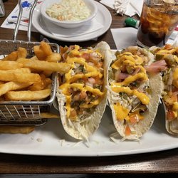 Fish tacos, French fries and coleslaw