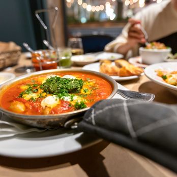 Oren's Hummus - Traditional Shakshuka $16 + Turkey Sausage $4.95 + Mozzarella and Pesto $3.10 - Mediterranean Near Me - Cupertino, California
