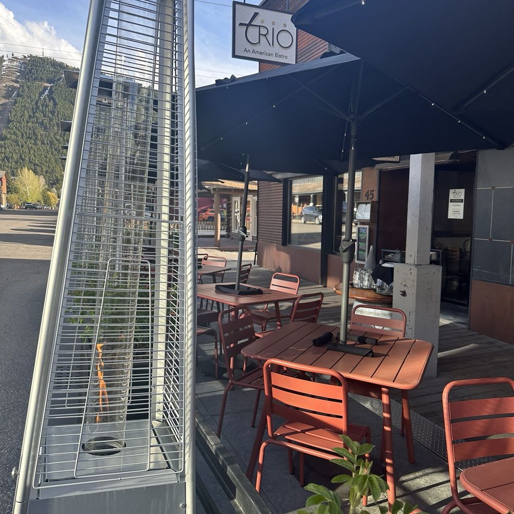 Trio American Bistro - Dining patio at entrance - New American Near Me - Jackson, Wyoming Trio American Bistro - Dining patio at entrance - New American Near Me - Jackson, Wyoming