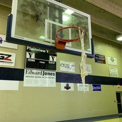 YMCA - Only available goal with free throw and 3 point lines. Net hanging by a thread.