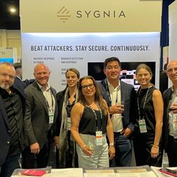 Nicholas Gentry -- The Intellectual's Illusionist - With the Sygnia team at their trade show booth