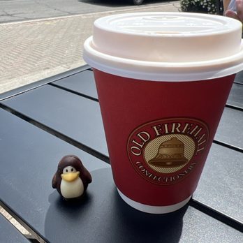 Old Firehall Confectionery - Penguin truffle and a coffee - Chocolatiers & Shops Near Me - Unionville, Ontario Old Firehall Confectionery - Penguin truffle and a coffee - Chocolatiers & Shops Near Me - Unionville, Ontario