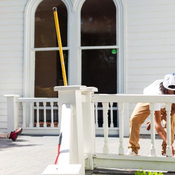 Marion's Painting Contractors - a man painting a porch - Painters Near Me Marion's Painting Contractors - a man painting a porch - Painters Near Me